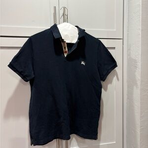 Burberry Men's Dark Polo with Signature Check
Navy blue XL